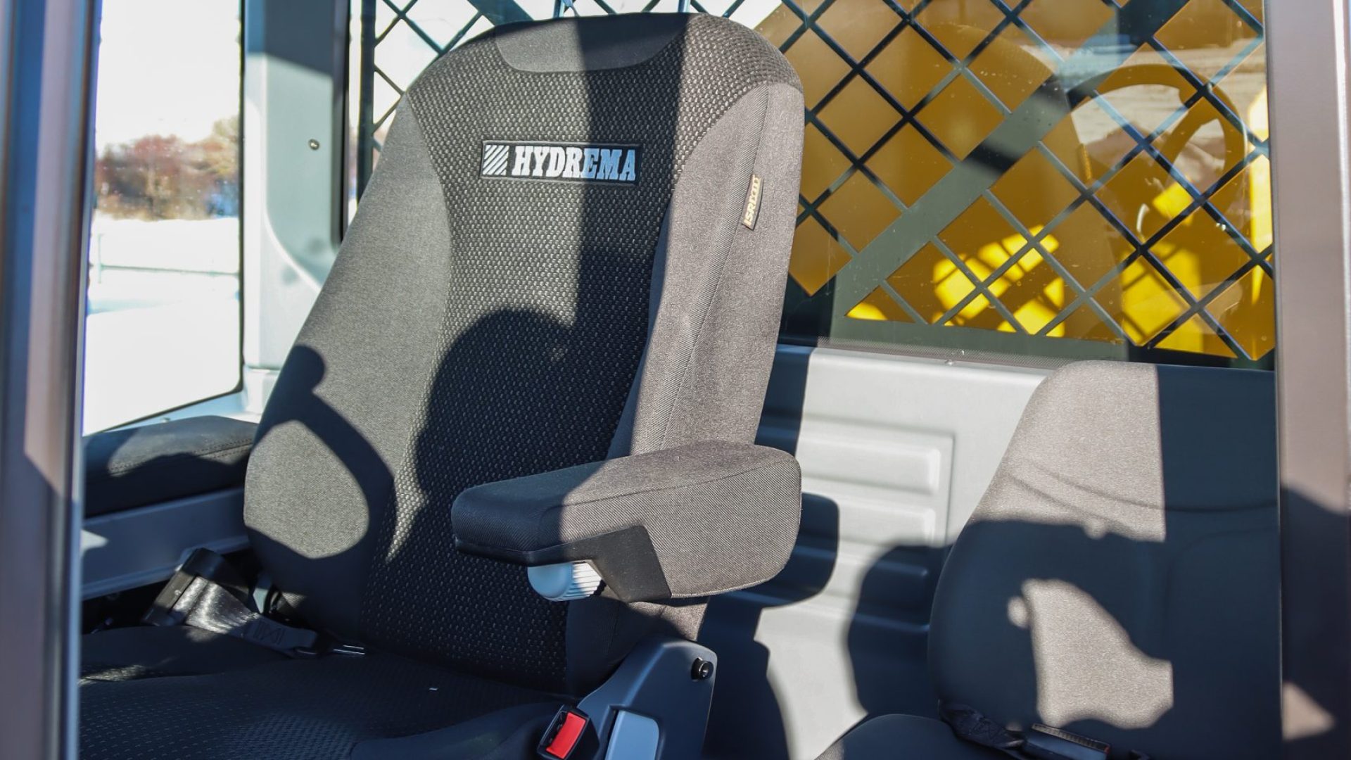 Driver and passenger seats inside the DT22 HM cab