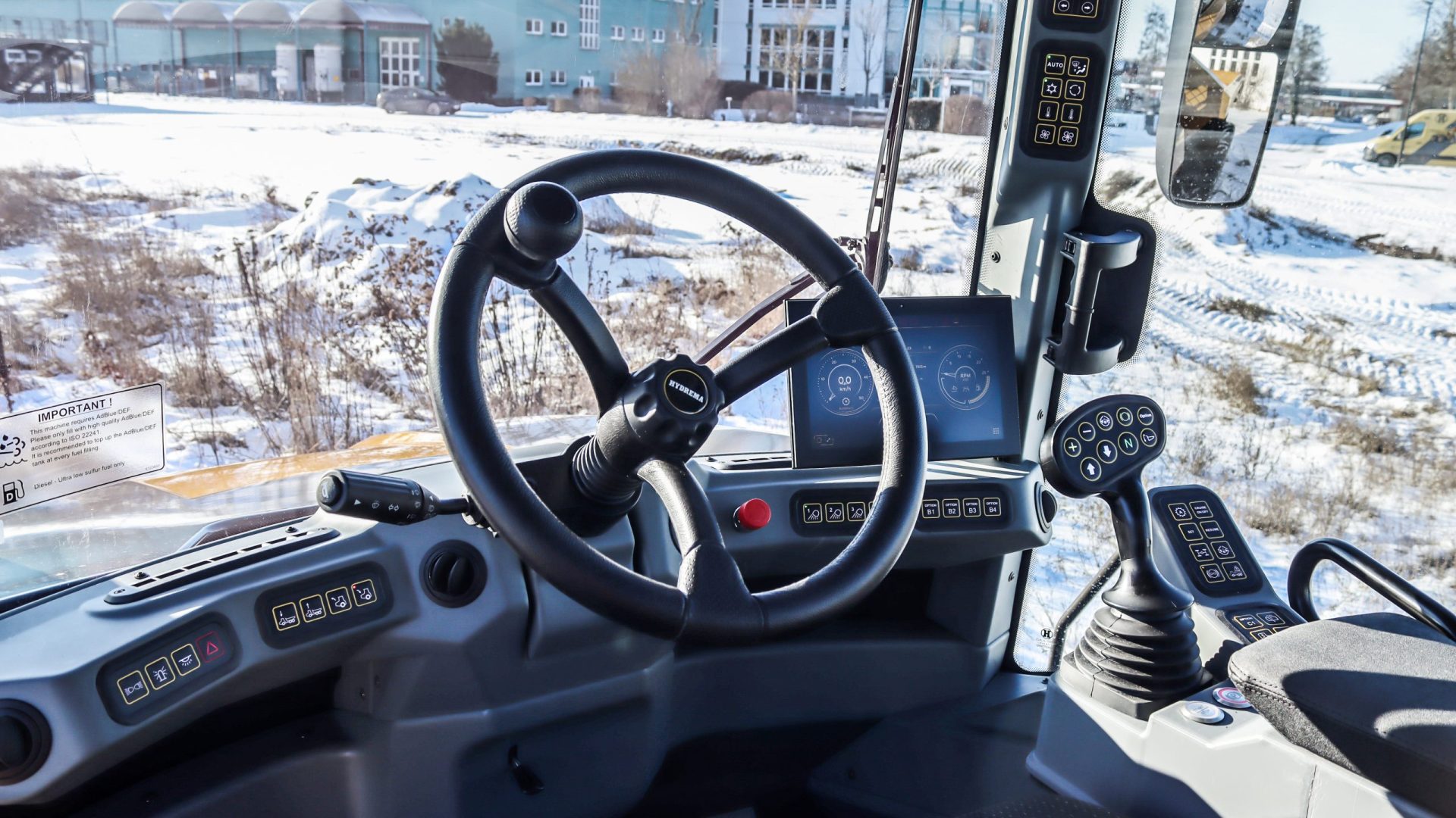 DT22 HM cab with steering wheel, touchscreen and joystick controls